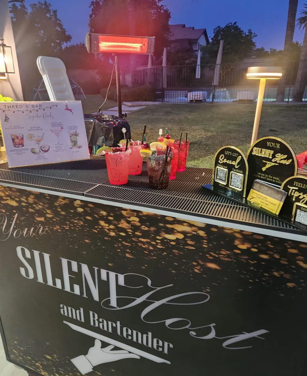 Outdoor cocktail bar setup with signature drinks for private event at Orangecrest Club