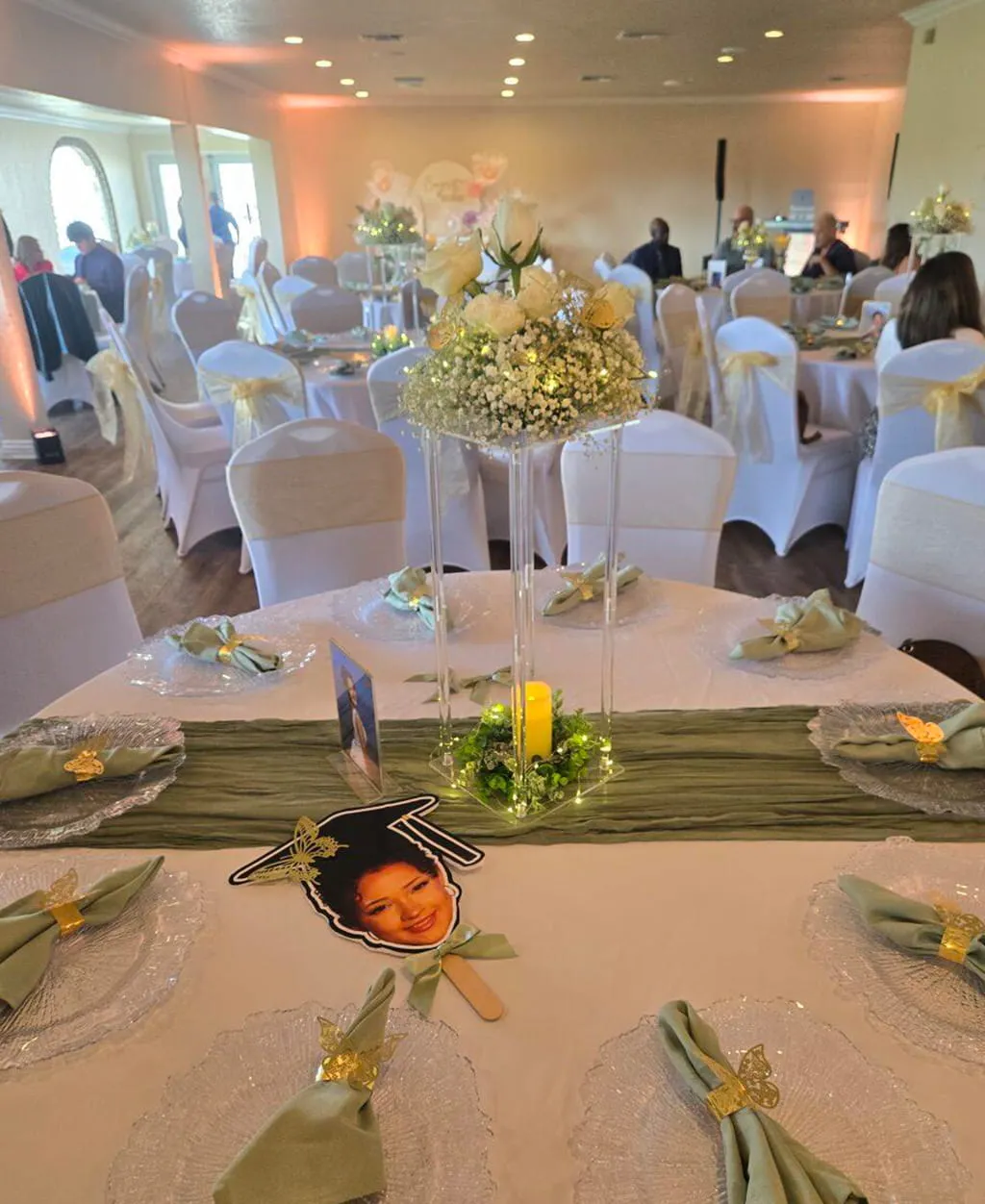 Elegant wedding reception table setup with floral centerpieces at Orangecrest Club