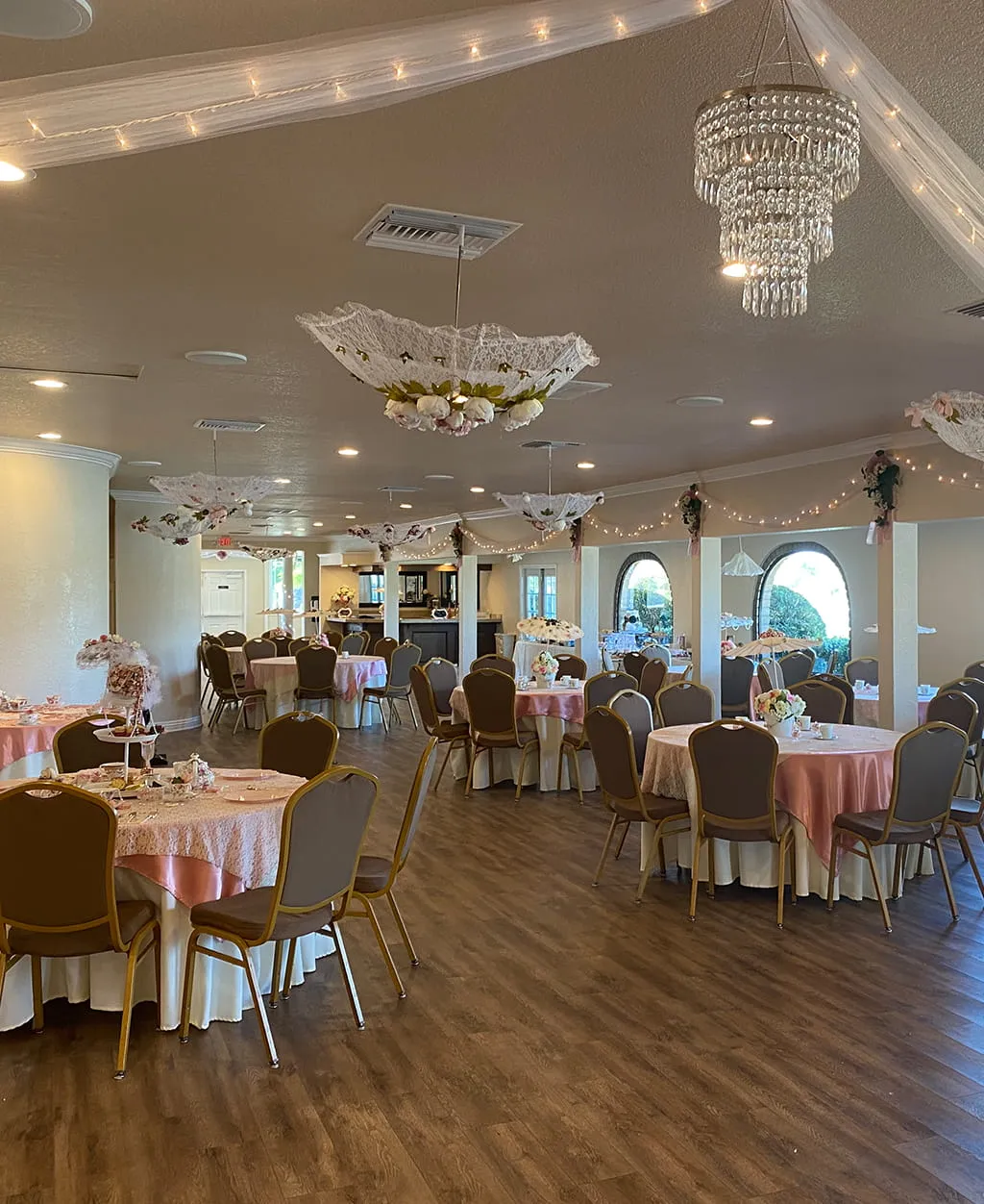 Beautifully decorated event hall with pink theme setup at Orangecrest Club