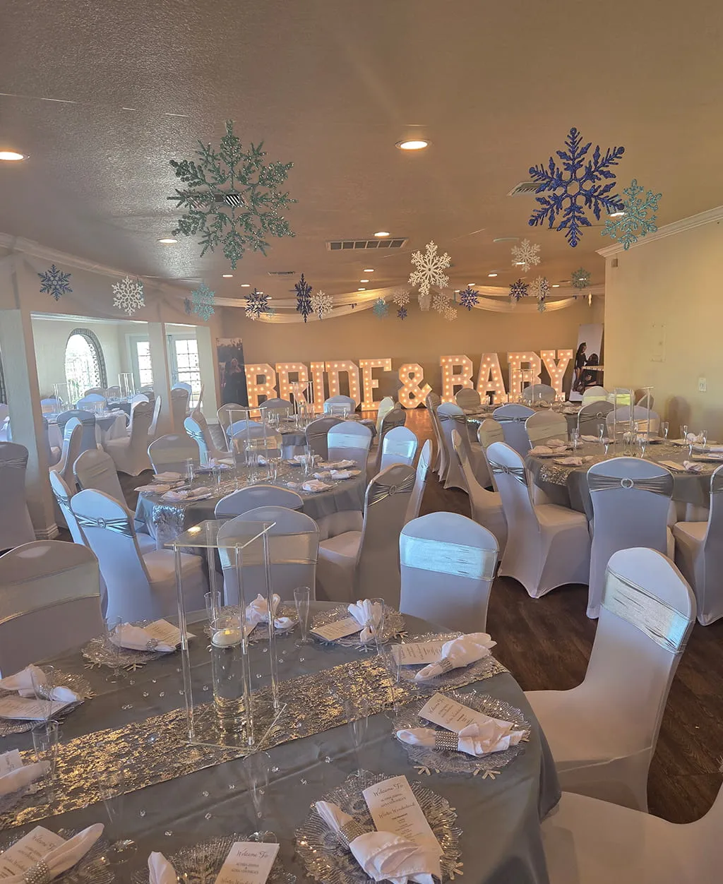 Bride and baby shower event setup with winter theme decor at Orangecrest Club