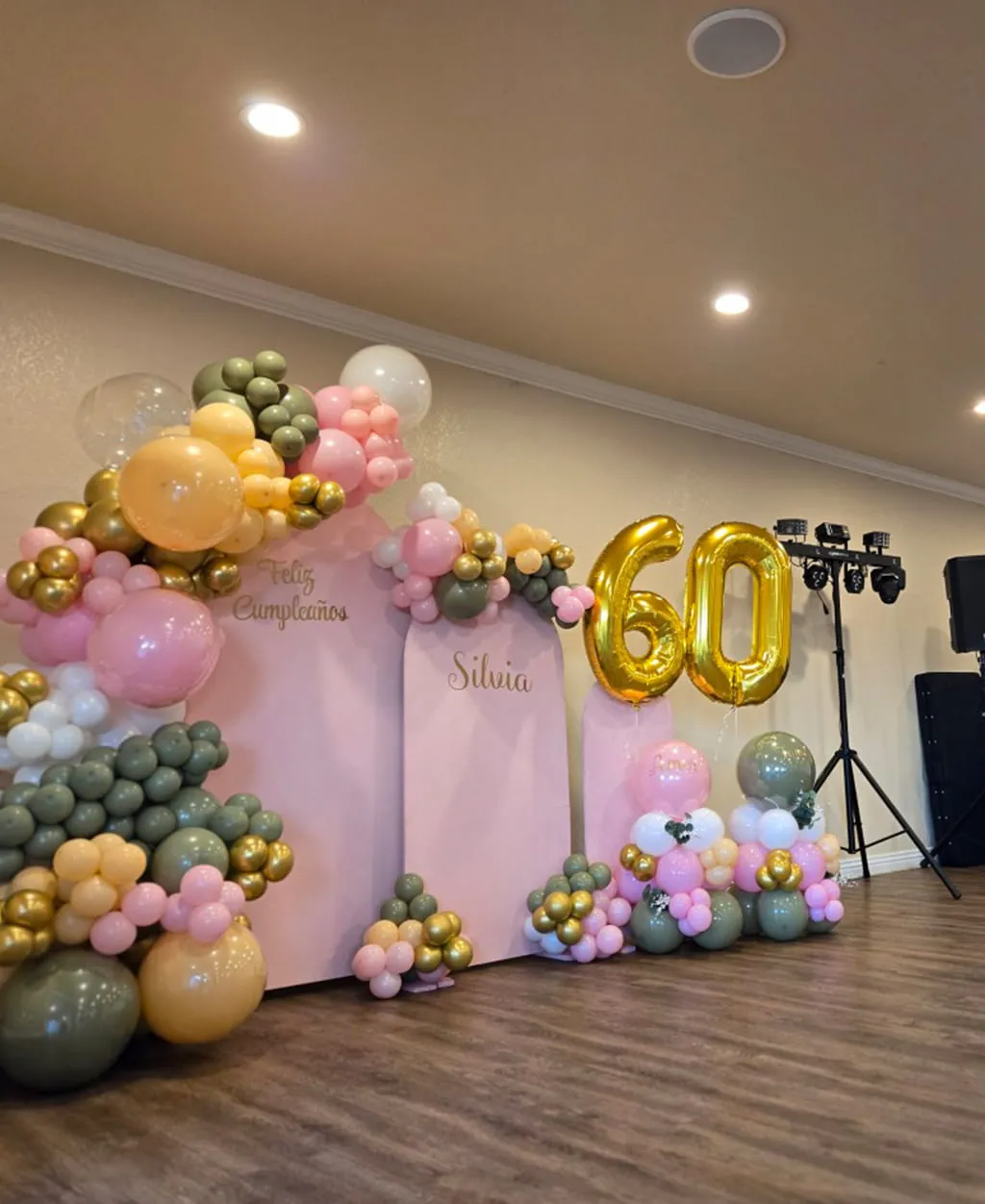 60th birthday celebration balloon backdrop and party setup at Orangecrest Club