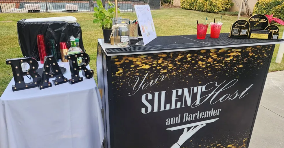 Outdoor bar setup with silent host and bartender service at Orangecrest Club event venue